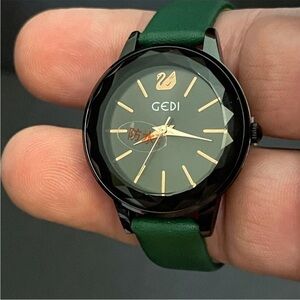 GEDI Black and Green Watch with Gold Accents